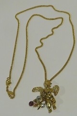 Vintage KIRKS FOLLY Fairy Angel Moon Stars Gold tone necklace Aurora Borealis