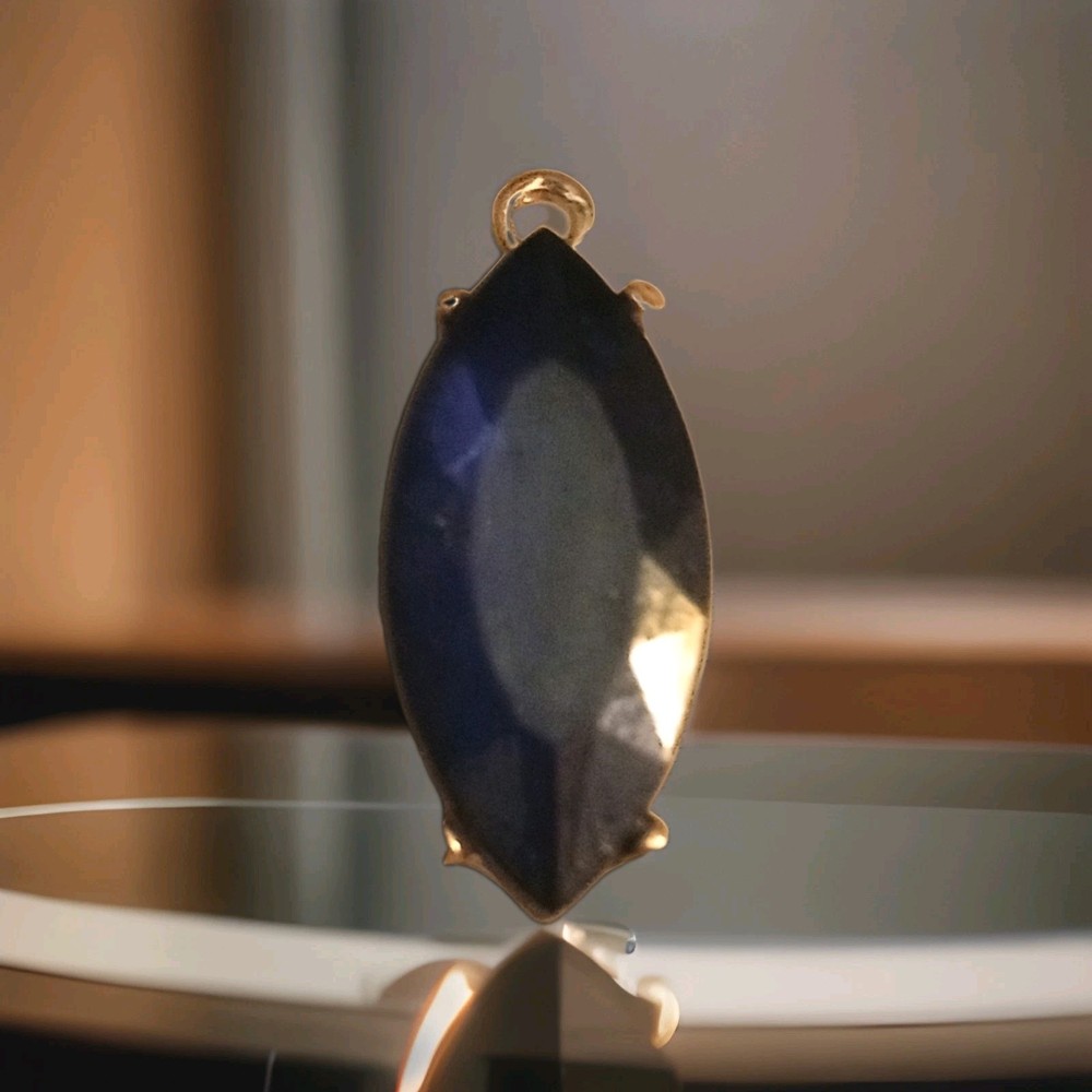 Rare Marquise shape Agate Geode Stone mounted in a 14k gold-plate bezel setting.