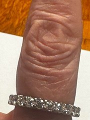 Size 8 earth mined diamond, platinum Eternity Band, purchased from Costco