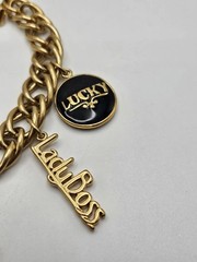 Vintage Jackie Collins Gold Tone Enamel Lady Boss Charm Bracelet Toggle Clasp