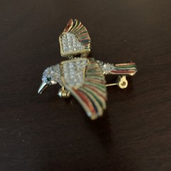 Gold tone colorful bird pin with rhinestones and moveable wings