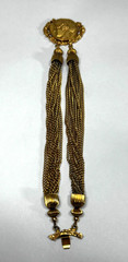 Vintage Ornate Gold-tone Coin attached to 24 dangling tassel Chains Bracelet