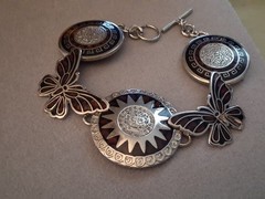Mexican alpaca silvertone butterfly & Aztec sun medallion bracelet. 7″