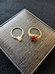 TWO PRE OWNED GOLD RINGS