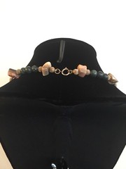 Shell Pendant on a Green, Gold, and Tan Necklace – 25.25 in.
