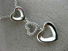 ESTATE .06CT DIAMOND 14KT WHITE GOLD 3D OPEN TRIPLE HEART FLOATING LOVE PENDANT
