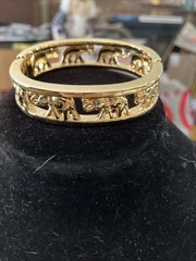 gold tone elephant hinged bracelet Trunks Up Green Eyes Unsigned
