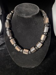Vintage tribal-style statement necklace, likely made from…
