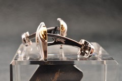 Near mint, gold and Cufflinks and silver tie clip, “Yves Saint Laurent”, case.