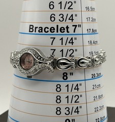 Delicate silver plated metalwork w pink and white stones in floral arrangement
