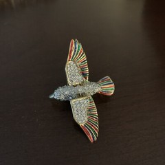 Gold tone colorful bird pin with rhinestones and moveable wings