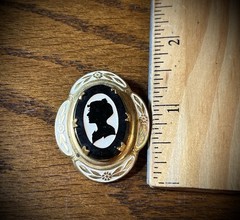 Antique Victorian gold and white colored brooch with black and white glass cameo