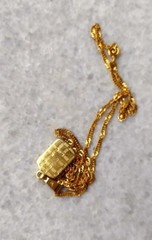 Vintage pendant with chain, golden tone metal