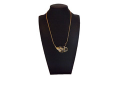Steuben glass rose bud mounted with a 14kt yellow gold 17″ neck chain
