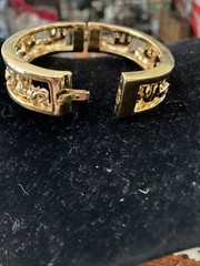gold tone elephant hinged bracelet Trunks Up Green Eyes Unsigned