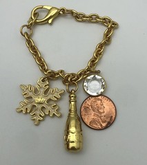Vintage Juicy Couture Gold Tone Snowflake Champagne Bottle Bag Charm Bracelet