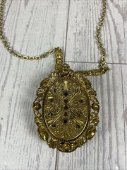 Vintage Western Germany Necklace Ornate Brass Filigree With Green Rhinestones.