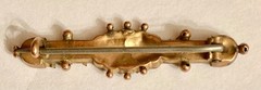 English Edwardian Sydenham Brothers 9 carat gold love pin brooch, c.1890-1915