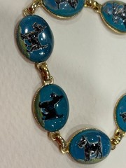 Vintage gold tone glass reversed painted Essex crystal dog bracelet 8 1/4”
