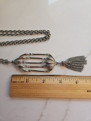 Vintage signed JJ JONETTE bird cage style tassel silver tone pendant necklace