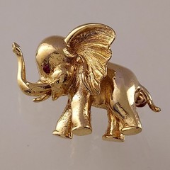 Vintage 14k Elephant Brooch with Red Eyes. High Polish and Textured. 4.8 Grams.