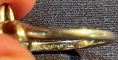 Ringcraft ring is crafted from 14k yellow gold/diamond and sapphire accents