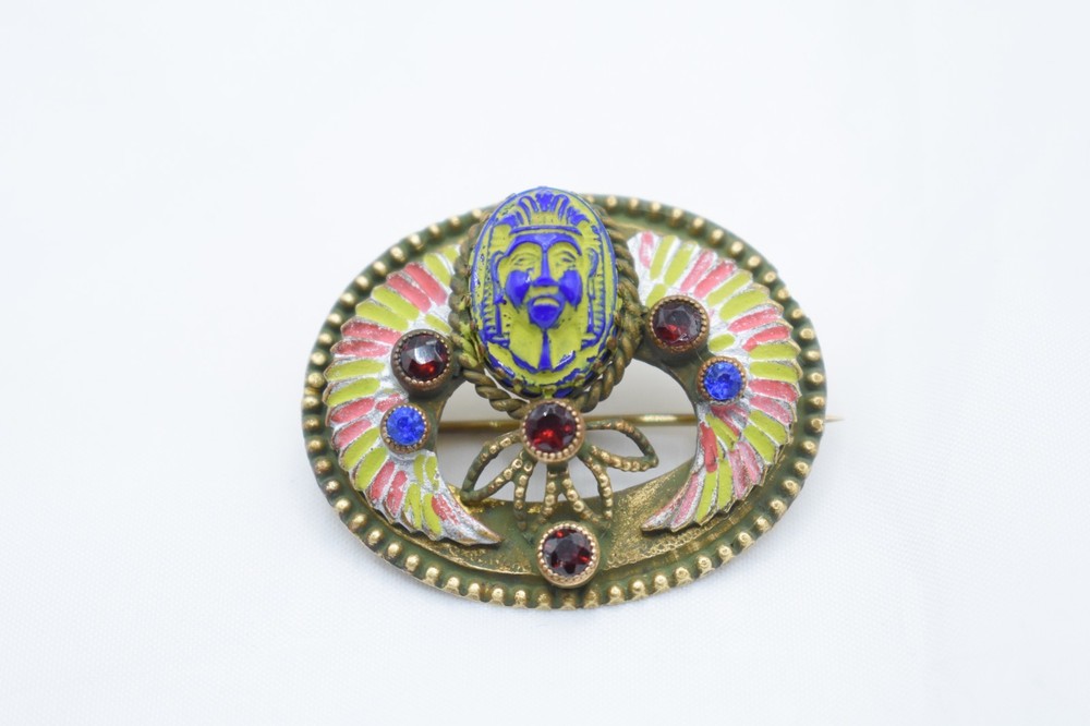 Antique Egyptian Revival winged scarab brooch featuring vibrant enamel work