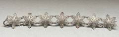 Antique Silver Bracelet featuring Finely detailed Filigree Flowers