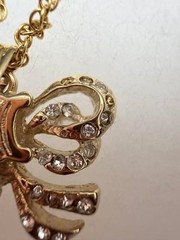 Authentic CELINE Paris Gold Tone Bow Crystal Pendant Necklace 26 in.