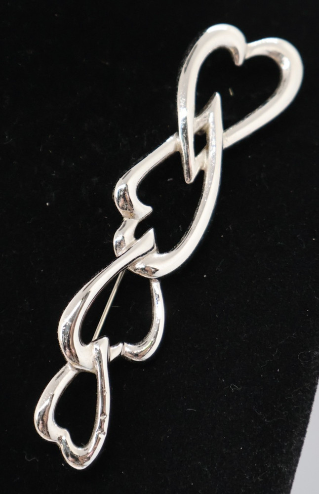 Vintage Monet Silver Tone 4 Interlocking Hearts Brooch 3.5 Inches Long