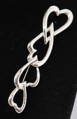 Vintage Monet Silver Tone 4 Interlocking Hearts Brooch 3.5 Inches Long