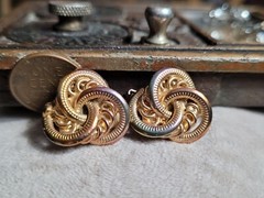 Vintage Costume jewelry clip on earrings 1980s 1990s Iridescent Gold Tone Knots