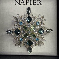 Napier silver-tone snowflake pin/brooch featuring blue and green rhinestones NOS