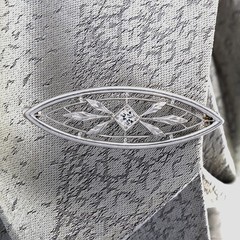 Antique Edwardian platinum Old European diamond brooch/lapel pin. By Krementz.
