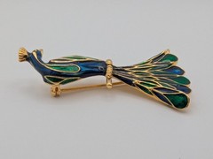 Vintage Peacock Brooch with enamel work and gold-tone accents.