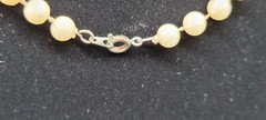 Vintage Man-Made Pearl Necklace. 19 inch long. Color Cream.