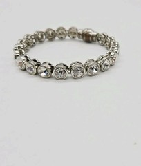 Carolee Tennis Bracelet White Round Crystal Silver tone Magnetic Signed 8.5 in