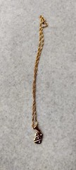 Vintage pendant with chain, golden tone metal