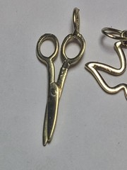 5.50 14K SOLID YELLOW GOLD, 6 14K Charms and one heavy charm holder
