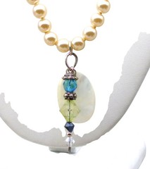 Crystal and Mother of Pearl Pendants on Lustrous Knotted Glass Pearl Strand
