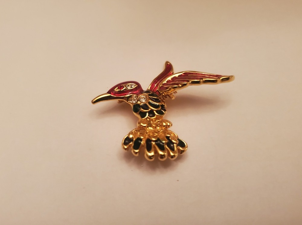 Hummingbird Brooch Features Gold-Tone Finish With Red And Black Enamel Detailing