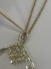 Vintage Magnifier Pendant Necklace. Gold tone. Made in USA in 1960’s. Hangs 15”