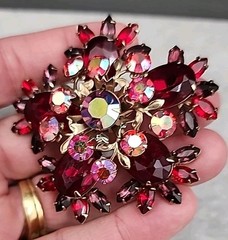 Vintage gold-toned Brooch featuring Ruby Red Navette and round Aurora Borealis
