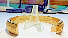 BEAUTIFUL GOLD LOOKING BRACELET .ENGRAVED CLASSIC WRIST BAND. IT IS NOT GOLD
