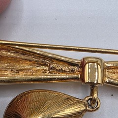 Monet Gold Tone Bow Brooch with Teardrop Crystal Dangle Pin Vintage Signed