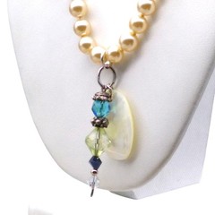 Crystal and Mother of Pearl Pendants on Lustrous Knotted Glass Pearl Strand