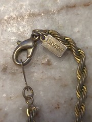 vintage Revlon women’s gold tone chain with metal cameo charm
