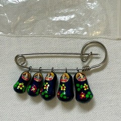 Authentic Russian matryoshka doll pin hand painted in Russia navy blue.