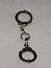 Vintage Zinc Alloy Miniature Law Enforcement Handcuffs Lapel Pin or Tie Tac
