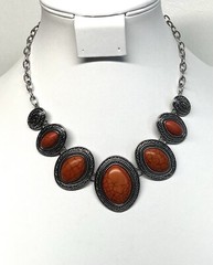 Orange Faux Howlite silver tone charm necklace 20”